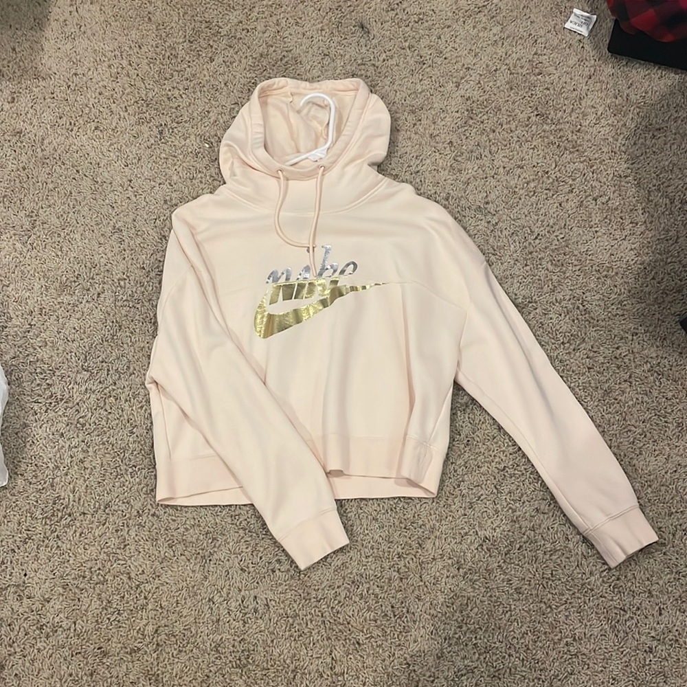 Light pink cropped Nike hoodie